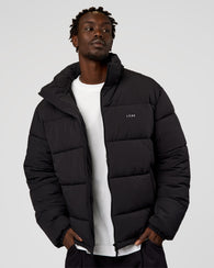 Man wearing Base Puffer Jacket - Black | Model:Okello | Size:L