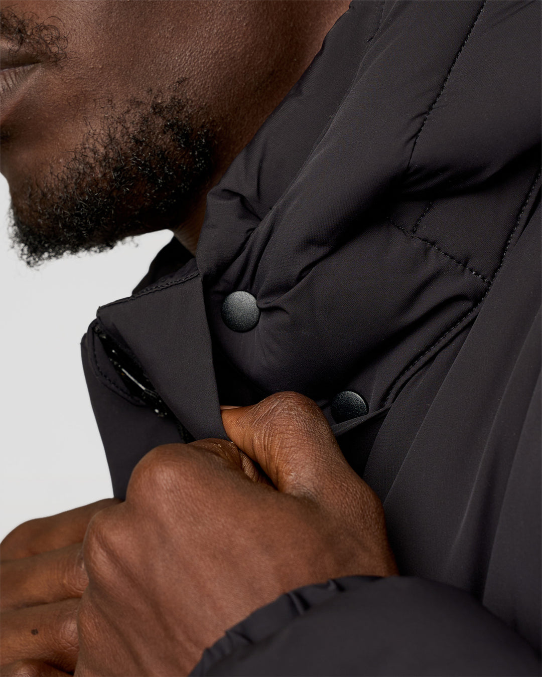 Man wearing Base Puffer Jacket - Black | Model:Okello | Size:L - view 12