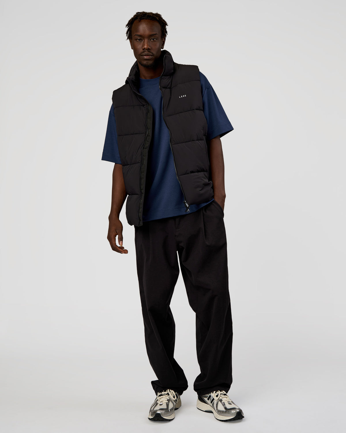 Man wearing Base Puffer Vest - Black | Model:Okello | Size:L - view 1