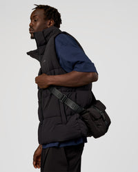 Man wearing Base Puffer Vest - Black | Model:Okello | Size:L | Thumbnail Index: 7