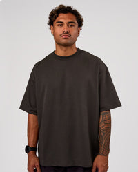 Man wearing AfterDark ZeroCrease Oversized Tee - Onyx | Model:Xav | Size:L | Thumbnail Index: 2