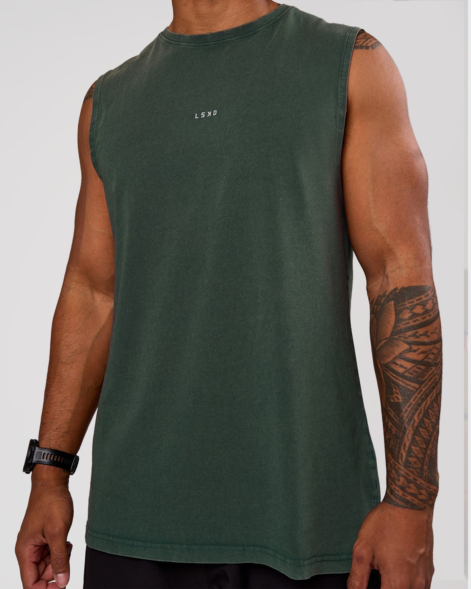 Man wearing Base FLXCotton Tank - Midnight Green Washed | Model:Xav | Size:L