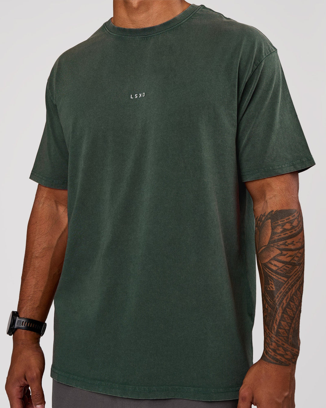 Man wearing Base FLXCotton Tee Oversized - Midnight Green Washed | Model:Xav | Size:L - view 2