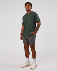 Man wearing Base FLXCotton Tee Oversized - Midnight Green Washed | Model:Xav | Size:L | Thumbnail Index: 4