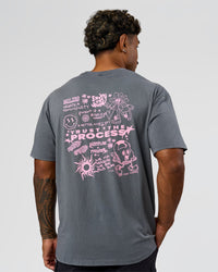 Man wearing Built On Values FLXCotton Oversized Tee - Dark Storm Washed-Pink Rose | Model:Xav | Size:L