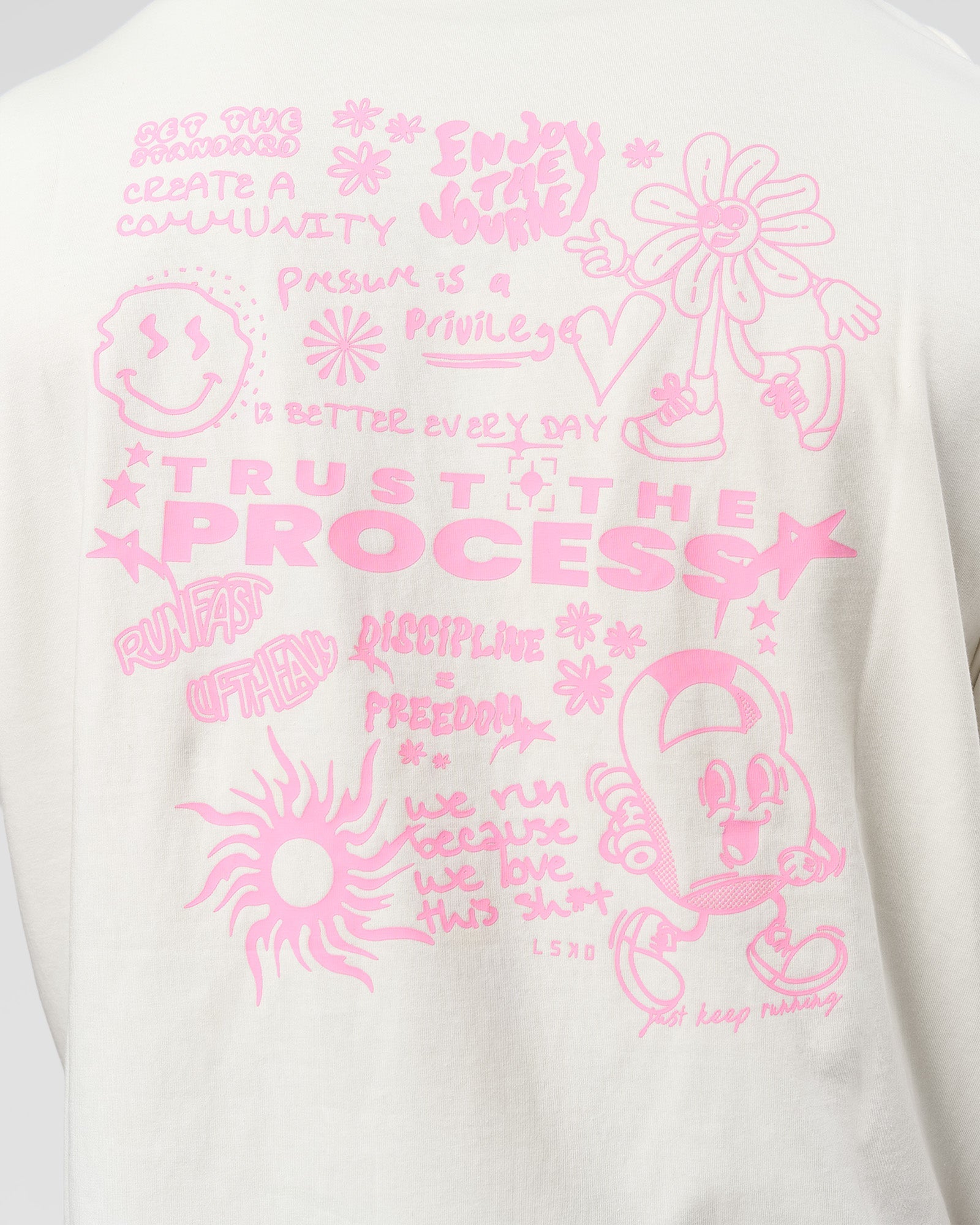 Man wearing Built On Values FLXCotton Oversized Tee - Off White-Pink Rose | Model:Xav | Size:L