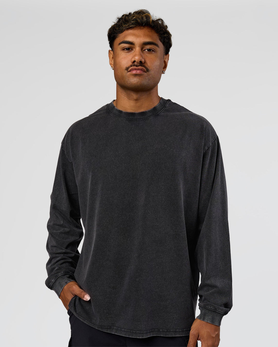 Man wearing Clear Vision Heavyweight FLXCotton Oversized LS Tee - Black Washed-Black | Model:Xav | Size:L - view 1