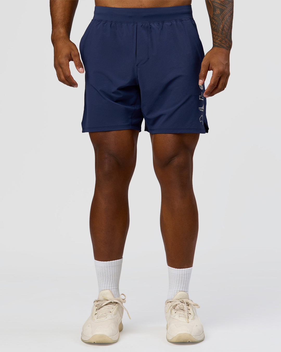 Man wearing Greatest of All Time Functional Training 7" Short - Future Navy-White | Model:Xav | Size:L - view 2