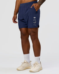 Man wearing Greatest of All Time Functional Training 7" Short - Future Navy-White | Model:Xav | Size:L | Thumbnail Index: 6