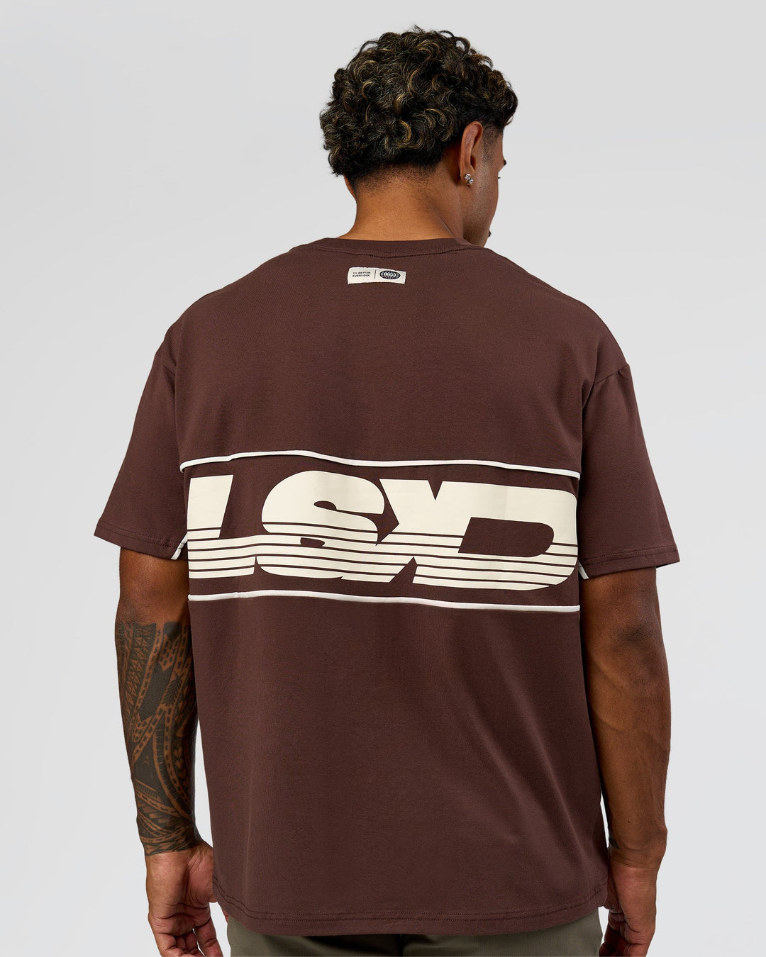 Man wearing Inline Heavyweight FLXCotton Oversized Tee - Hot Chocolate-Off White | Model:Xav | Size:L - view 2