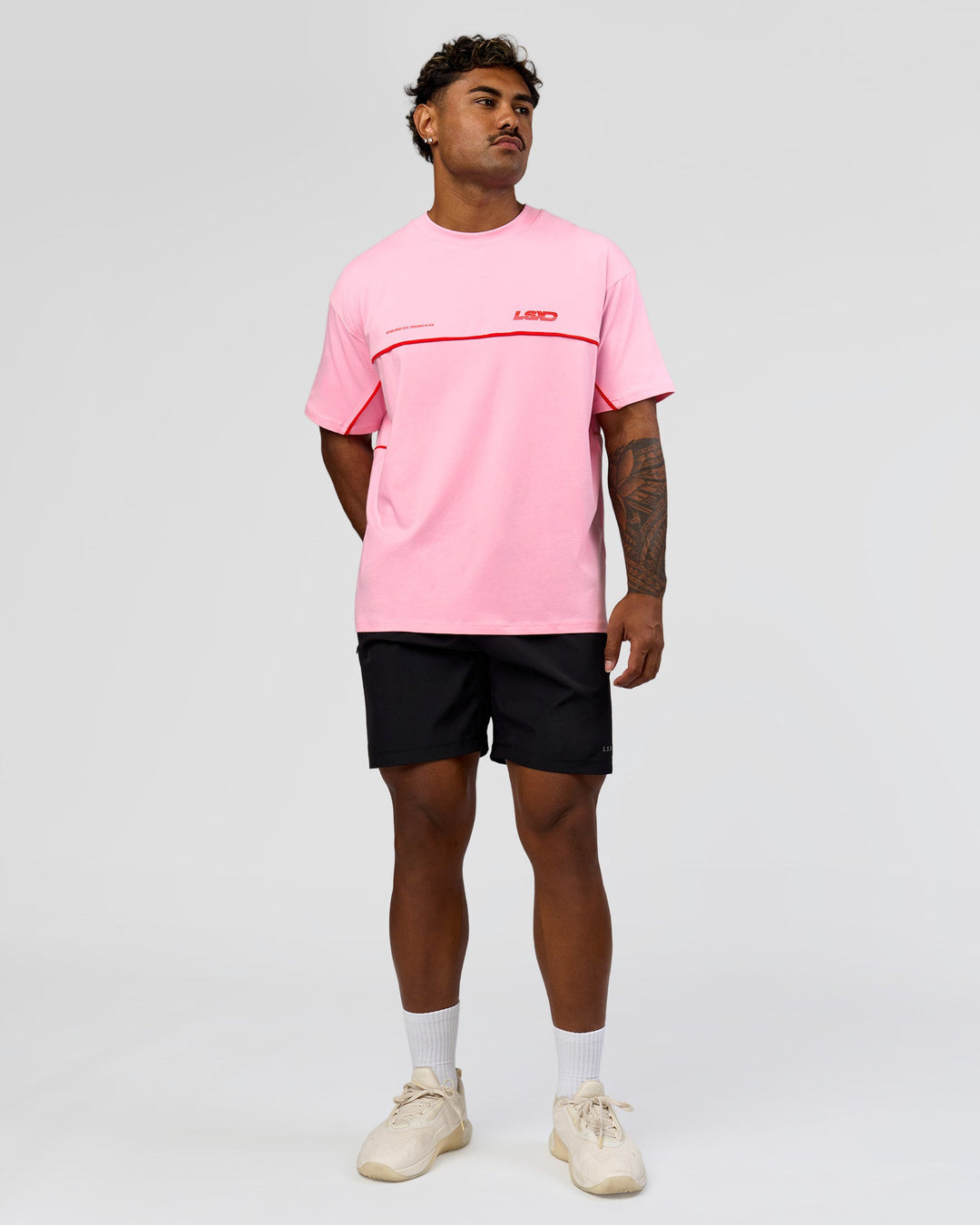 Man wearing Inline Heavyweight FLXCotton Oversized Tee - Pink Rose-Flame | Model:Xav | Size:L - view 8