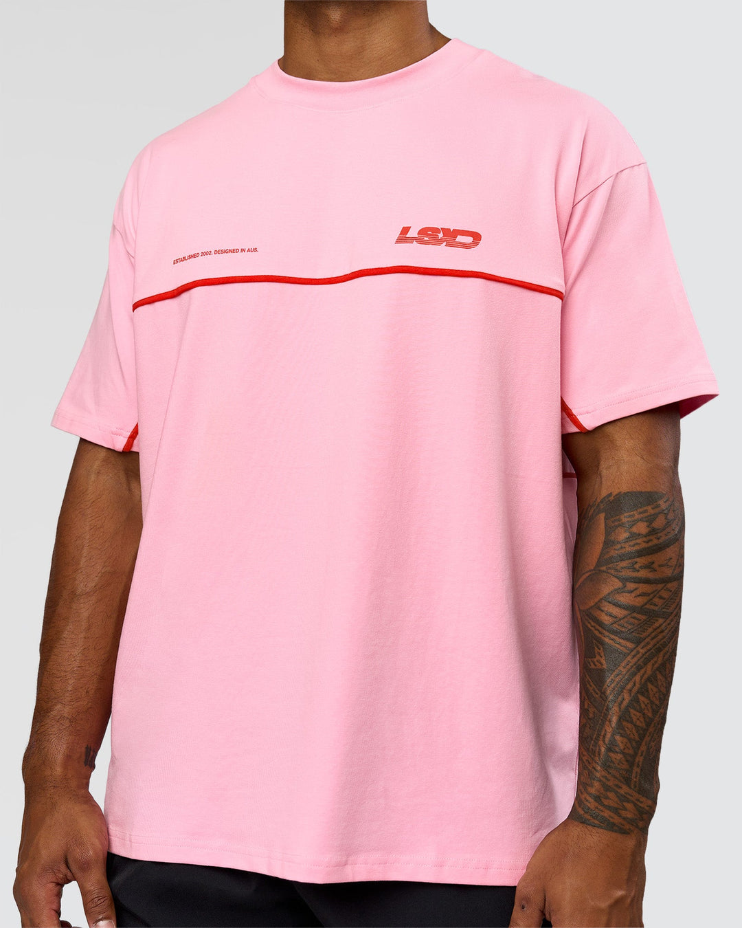 Man wearing Inline Heavyweight FLXCotton Oversized Tee - Pink Rose-Flame | Model:Xav | Size:L - view 11