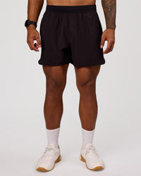 Man wearing Lift 6" Short - Black-Reflective | Model:Xav | Size:L | Thumbnail Index: 4