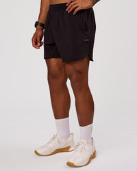 Man wearing Lift 6" Short - Black-Reflective | Model:Xav | Size:L | Thumbnail Index: 5
