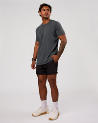 Man wearing Rep 5" Performance Short - Black | Model:Xav | Size:L | Thumbnail Index: 4