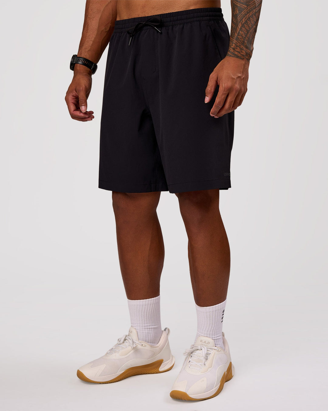 Man wearing Rep Movement 9" Training Short - Black | Model:Xav | Size:L - view 6
