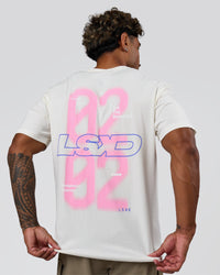 Man wearing SoCal 26 FLXCotton Oversize Tee  - Off White-Pink Rose | Model:Xav | Size:L | Thumbnail Index: 1