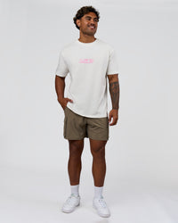 Man wearing SoCal 26 FLXCotton Oversize Tee  - Off White-Pink Rose | Model:Xav | Size:L | Thumbnail Index: 9