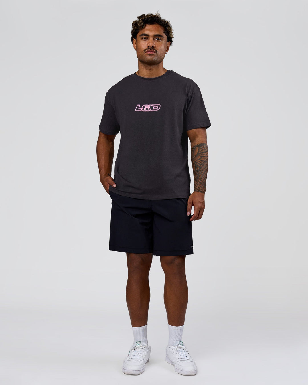 Man wearing SoCal 26 FLXCotton Oversize Tee  - Onyx-Pink Rose | Model:Xav | Size:L - view 8