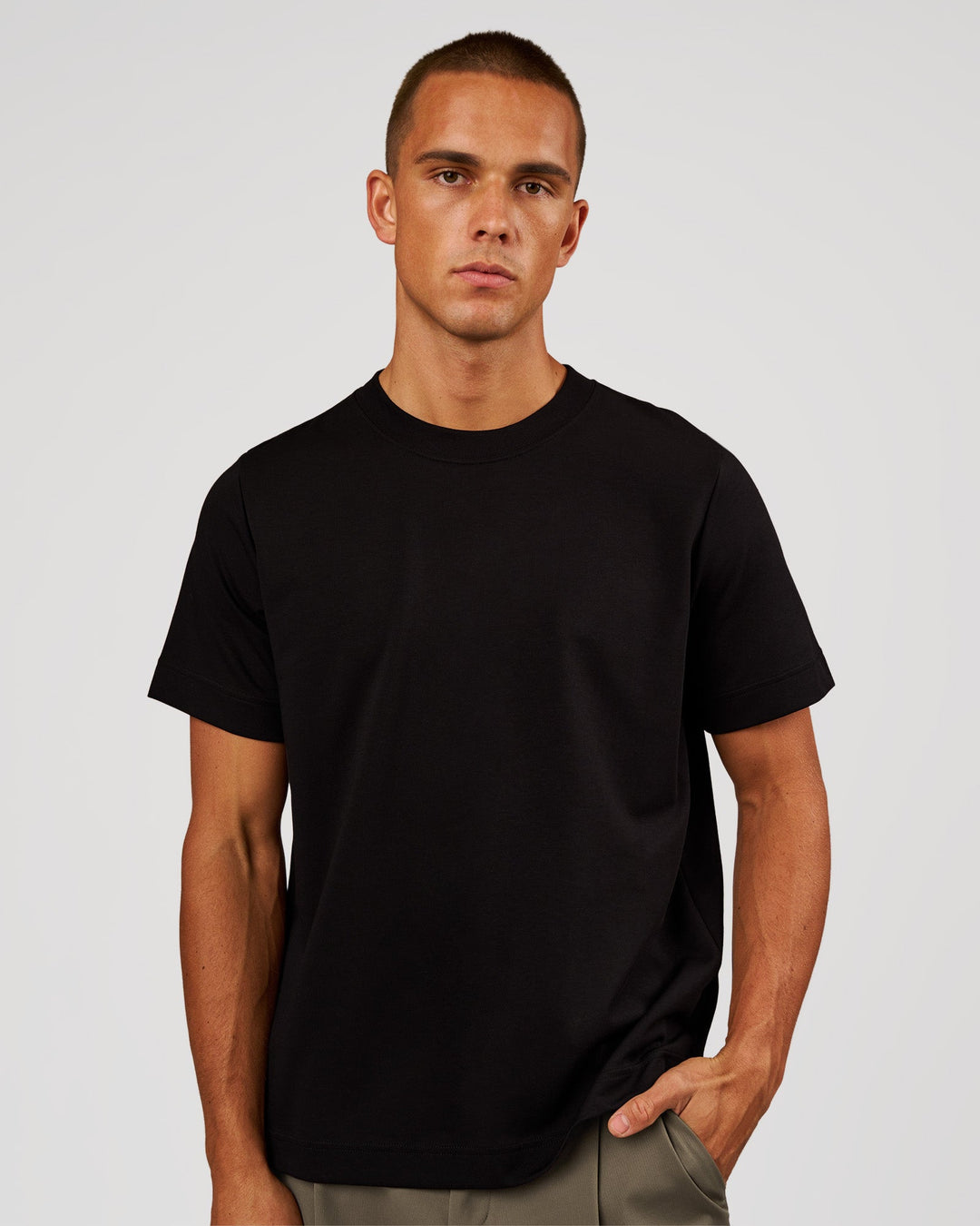Man wearing AfterDark ZeroCrease Regular Tee - Black | Model:Albert | Size:M - view 1