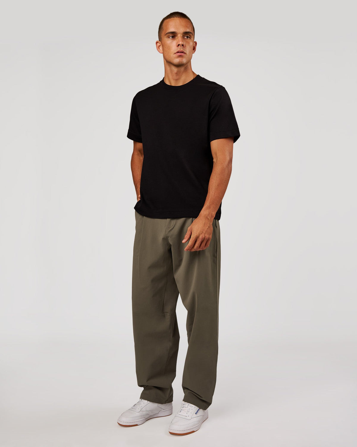 Man wearing AfterDark ZeroCrease Regular Tee - Black | Model:Albert | Size:M