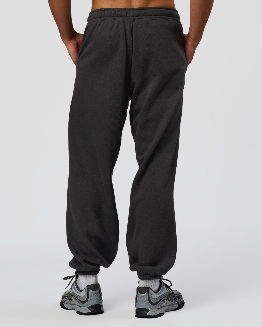 Man wearing Base Baggy Cuffed Track Pant - Onyx | Model:Albert | Size:M - view 4