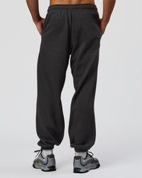 Man wearing Base Baggy Cuffed Track Pant - Onyx | Model:Albert | Size:M | Thumbnail Index: 3