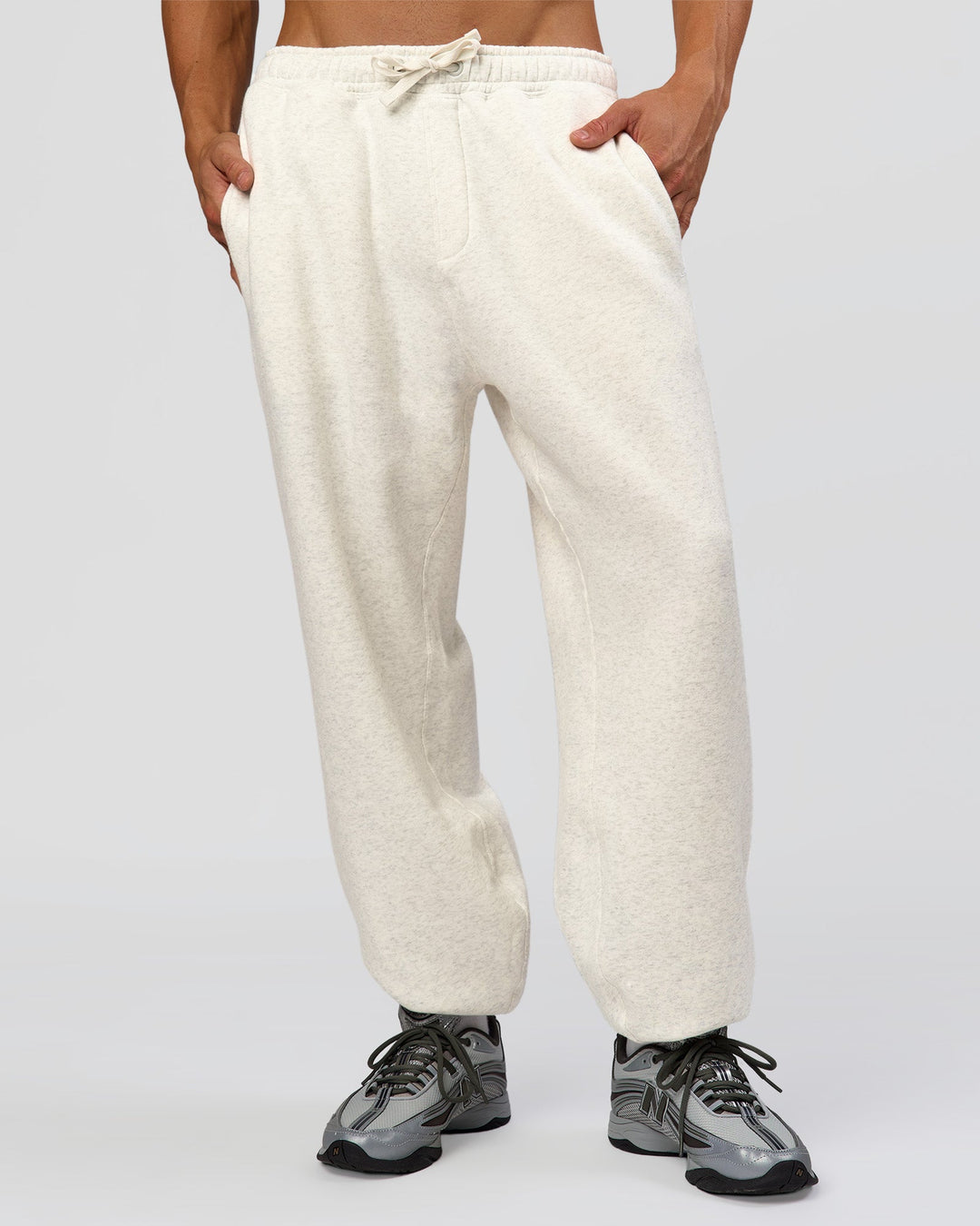Man wearing Base Baggy Cuffed Track Pant - Silver Marl | Model:Albert | Size:M - view 1