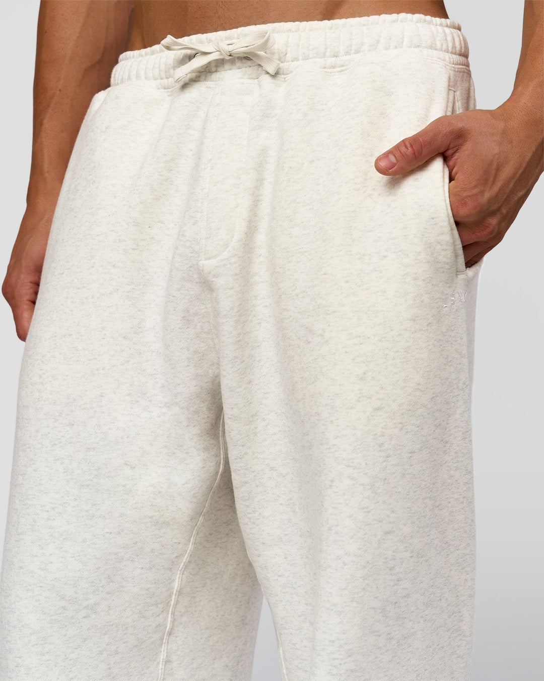 Man wearing Base Baggy Cuffed Track Pant - Silver Marl | Model:Albert | Size:M - view 4