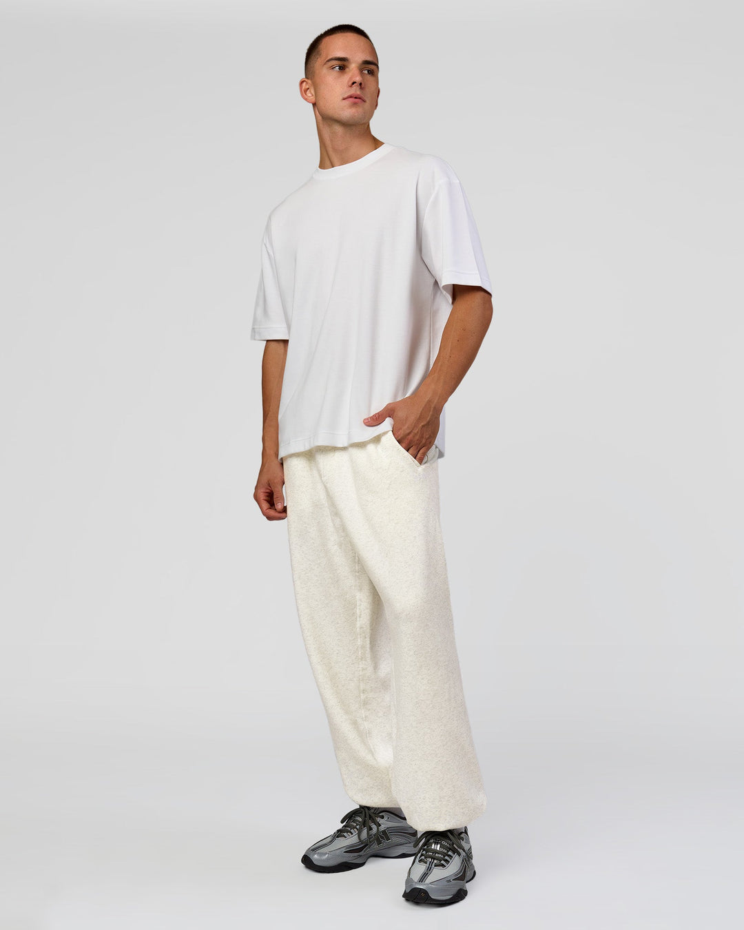 Man wearing Base Baggy Cuffed Track Pant - Silver Marl | Model:Albert | Size:M - view 5