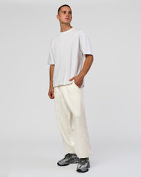 Man wearing Base Baggy Cuffed Track Pant - Silver Marl | Model:Albert | Size:M | Thumbnail Index: 4