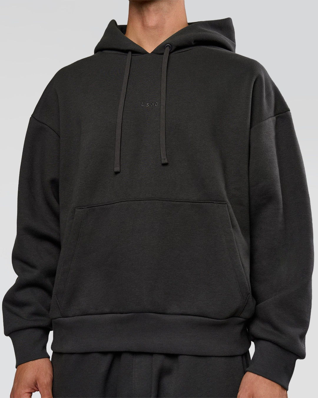Man wearing Base Oversized DC Hoodie - Onyx | Model:Albert | Size:M - view 6