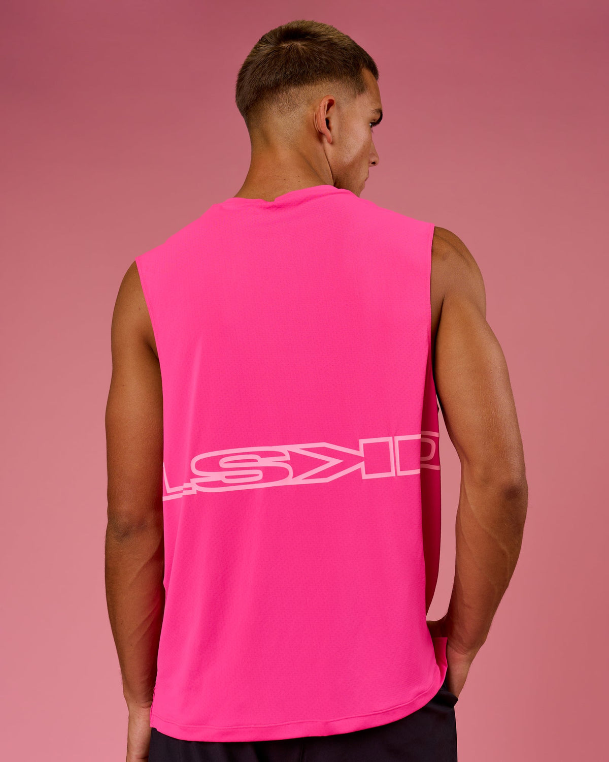 Man wearing BCAM Rep Muscle Training Tank - Ultra Pink | Model:Albert | Size:M - view 1