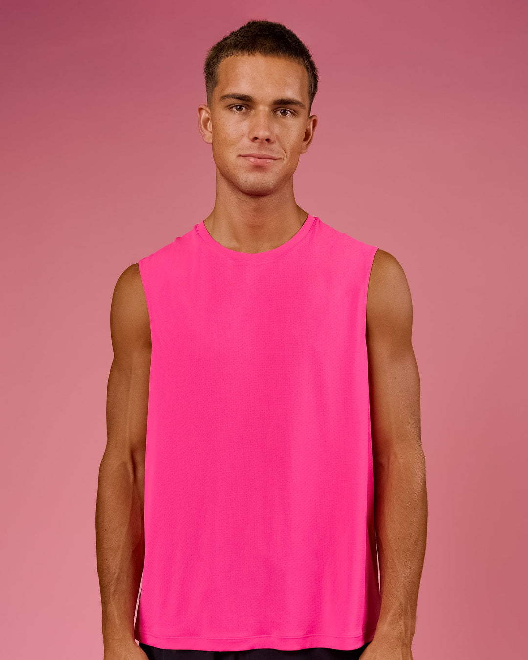 Man wearing BCAM Rep Muscle Training Tank - Ultra Pink | Model:Albert | Size:M - view 2