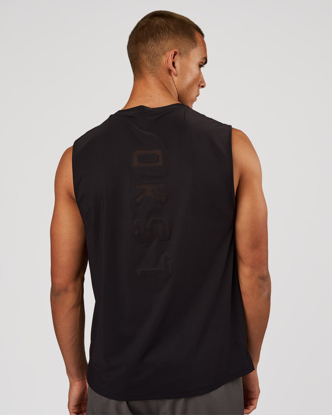 Man wearing Cadence Swift Muscle Tank - Black | Model:Albert | Size:M - view 3