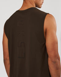 Man wearing Cadence Swift Muscle Tank - Ground Coffee | Model:Albert | Size:M | Thumbnail Index: 1