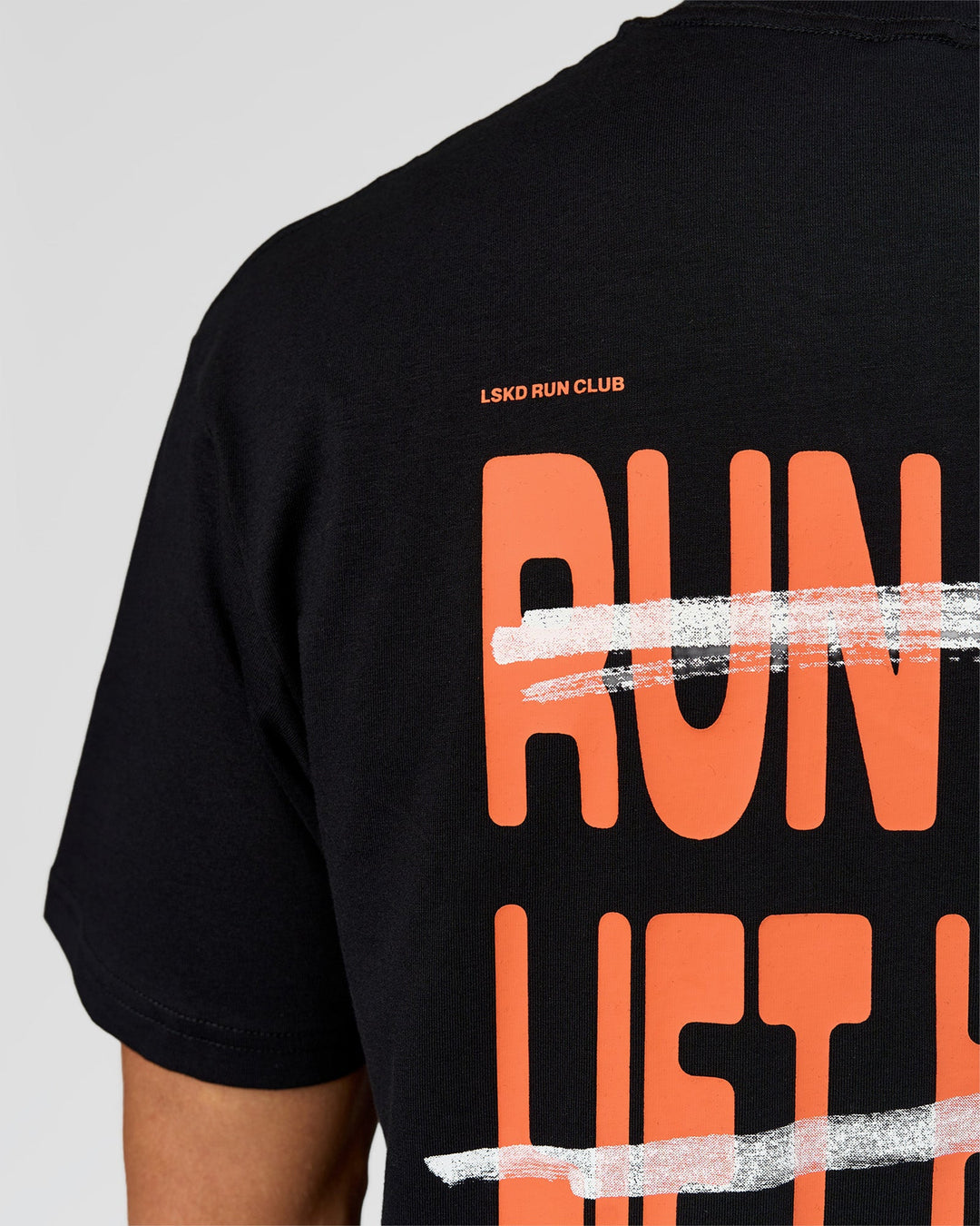 Man wearing Coffee Run FLXCotton Oversized Tee - Black-Ultra Orange | Model:Albert | Size:M - view 11