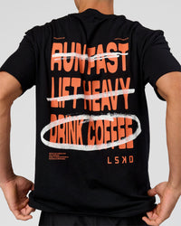 Man wearing Coffee Run FLXCotton Oversized Tee - Black-Ultra Orange | Model:Albert | Size:M | Thumbnail Index: 11