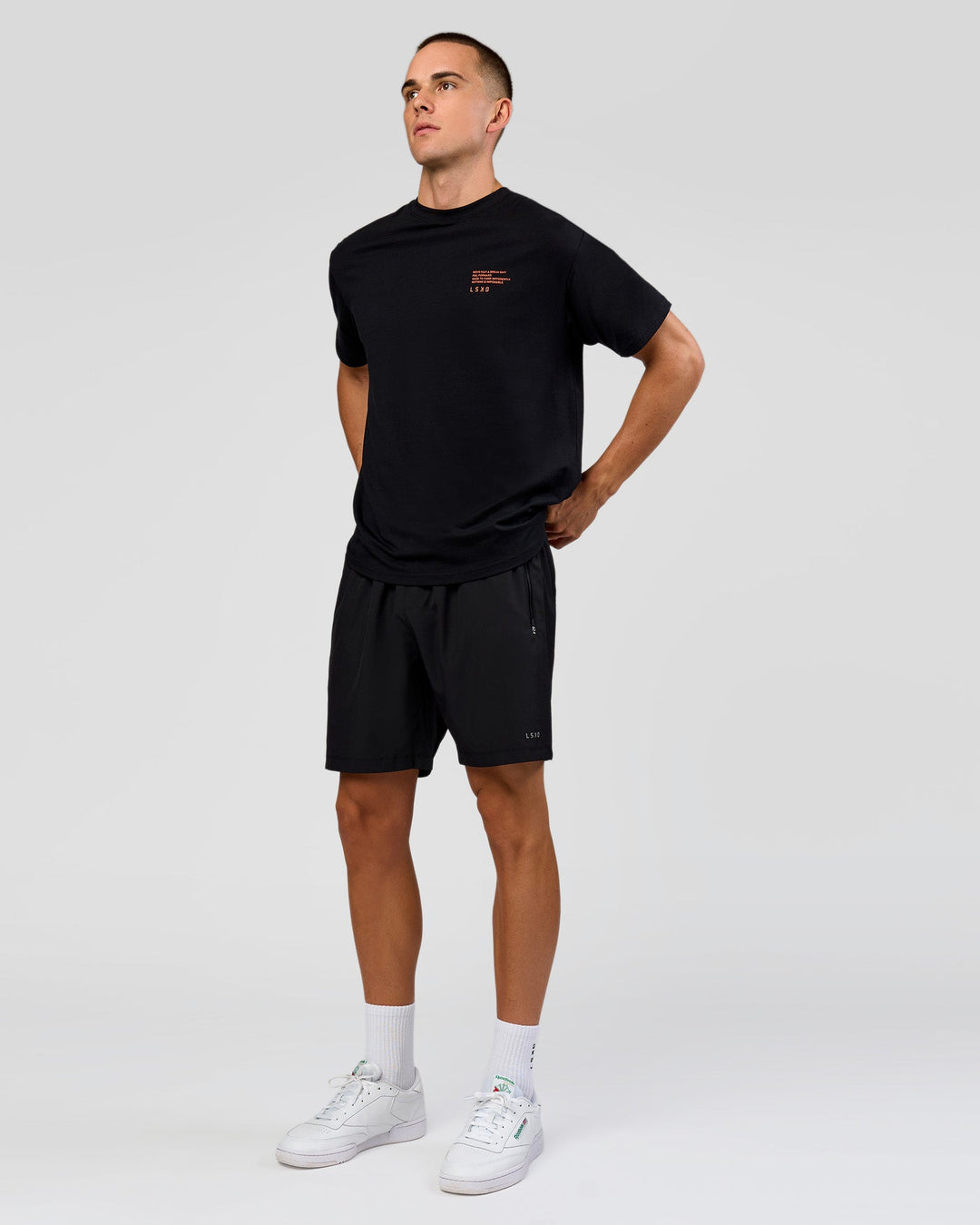 Man wearing Coffee Run FLXCotton Oversized Tee - Black-Ultra Orange | Model:Albert | Size:M - view 13