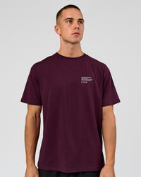 Man wearing Coffee Run FLXCotton Oversized Tee - Cherry Lacquer-Black | Model:Albert | Size:M | Thumbnail Index: 4