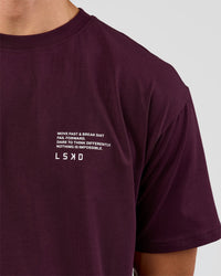 Man wearing Coffee Run FLXCotton Oversized Tee - Cherry Lacquer-Black | Model:Albert | Size:M | Thumbnail Index: 7