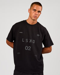 Man wearing Game Plan Heavyweight FLXCotton Oversized Tee - Black | Model:Albert | Size:M | Thumbnail Index: 10