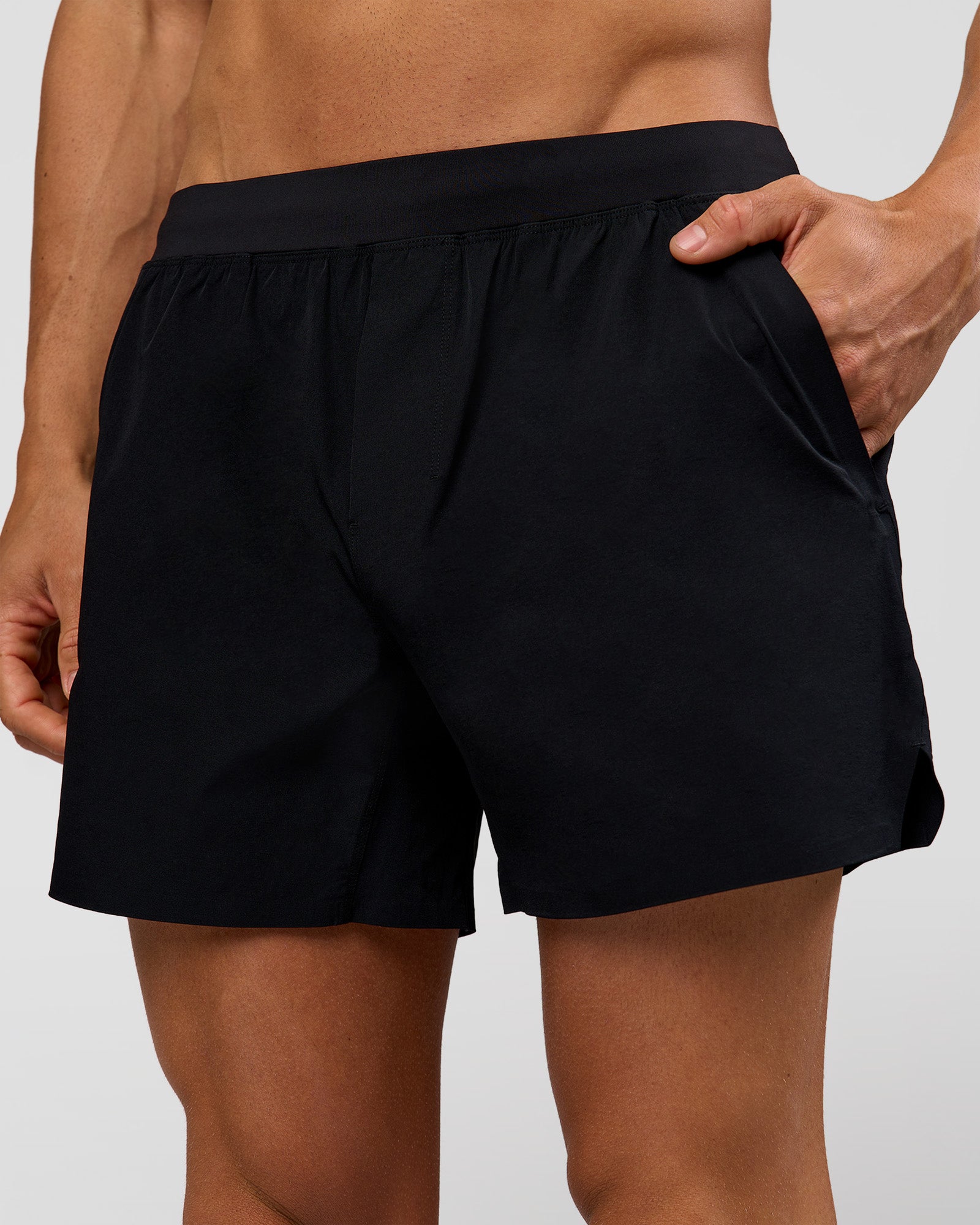 Man wearing Hybrid 5" Short - Black-Reflective | Model:Albert | Size:M