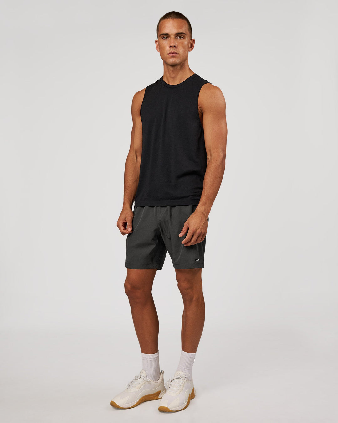 Man wearing AeroFLX+ Seamless Muscle Tank - Black Marl | Model:Albert | Size:M - view 5