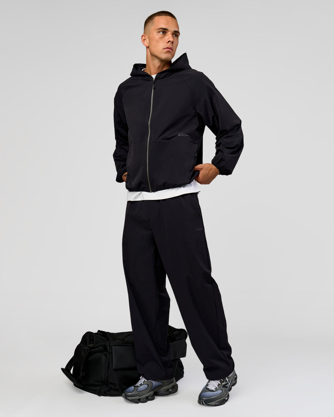 Man wearing Motion Hooded Jacket - Black | Model:Albert | Size:M - view 3