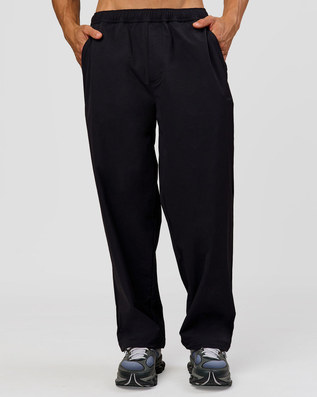 Man wearing Motion Wide Leg Pant - Black | Model:Albert | Size:M - view 7