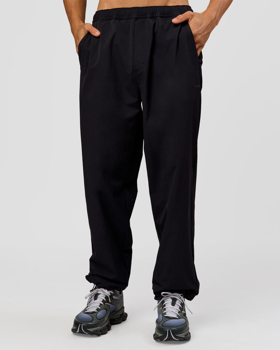 Man wearing Motion Wide Leg Pant - Black | Model:Albert | Size:M - view 10