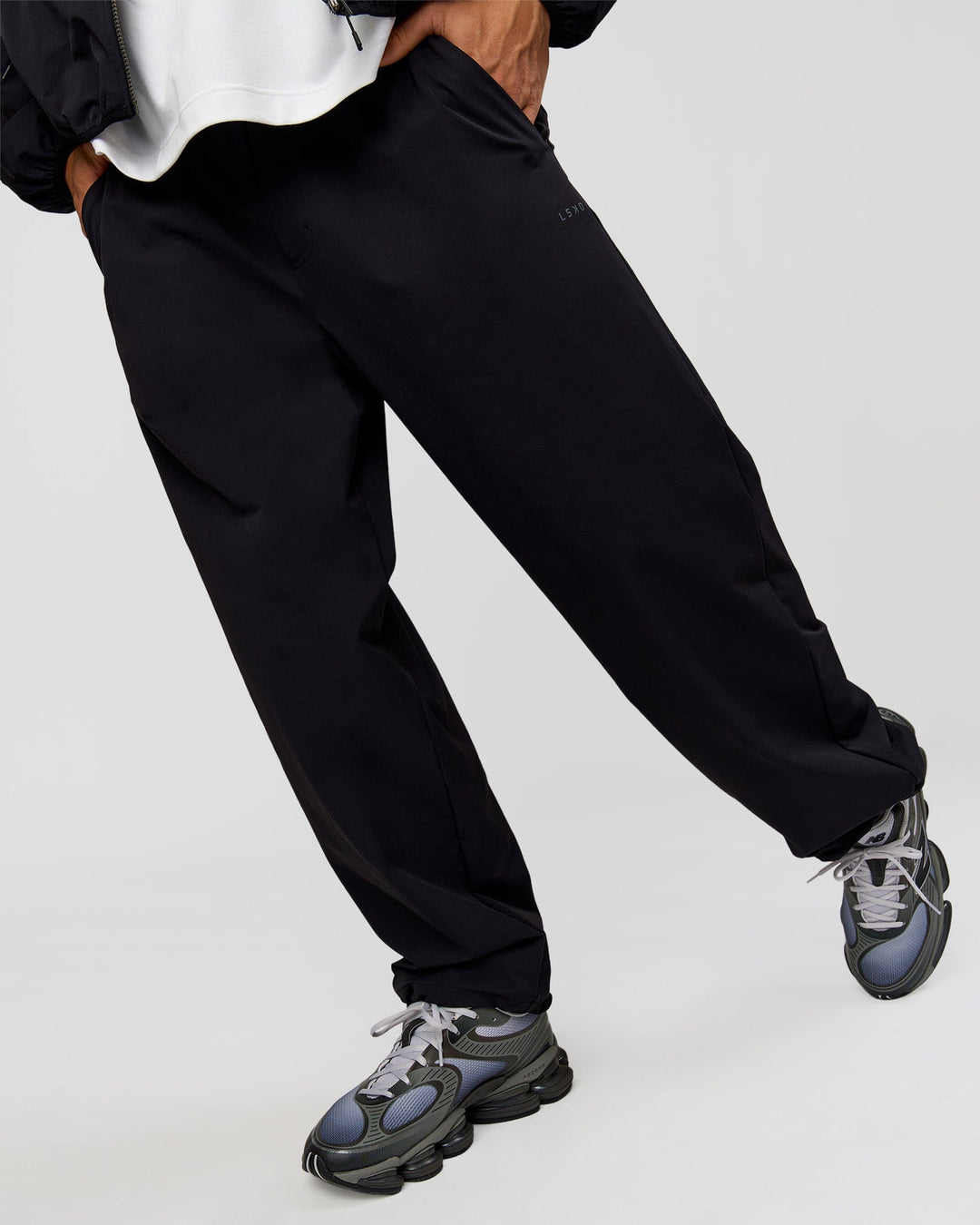 Man wearing Motion Wide Leg Pant - Black | Model:Albert | Size:M - view 12