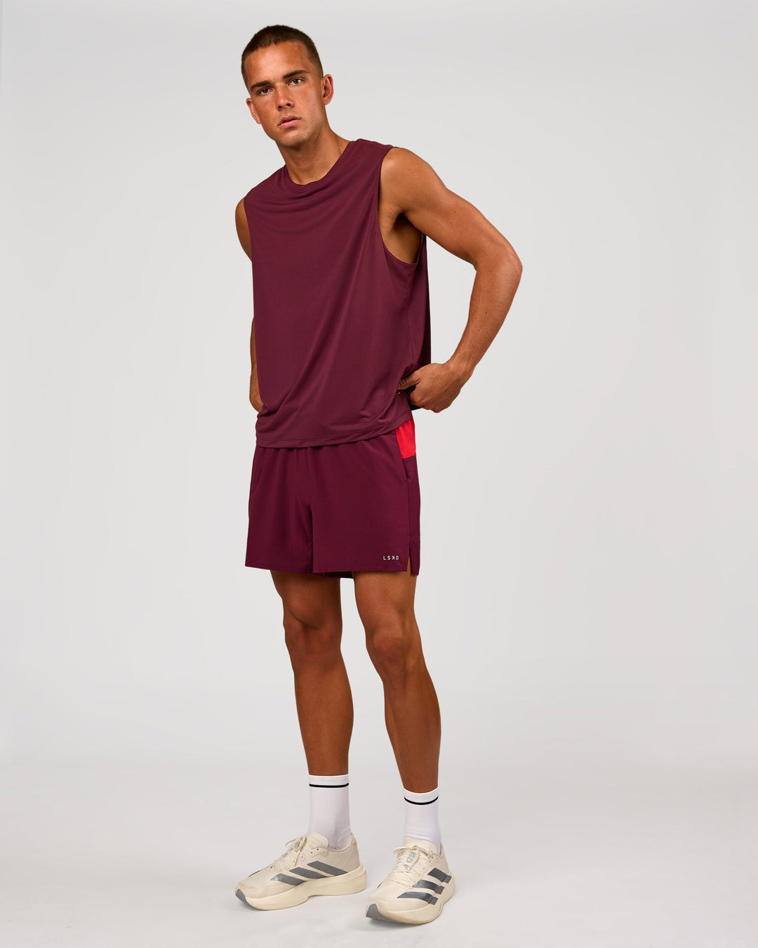 Man wearing Pace 5" Lined Running Short - Cherry Lacquer-Scarlet | Model:Albert | Size:M - view 10