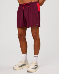 Man wearing Pace 5" Lined Running Short - Cherry Lacquer-Scarlet | Model:Albert | Size:M | Thumbnail Index: 10